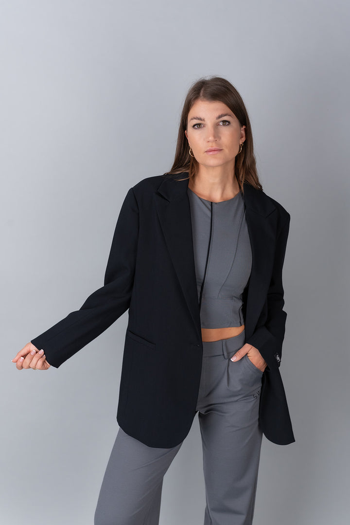 oversized black blazer on model front